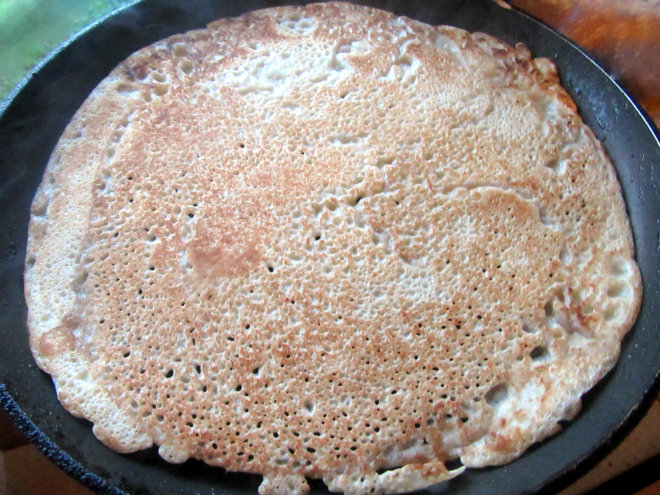 Shrove Tuesday crêpes by Laka kuharica: flip a pancake over with a spatula and fry until  lightly browned. 
