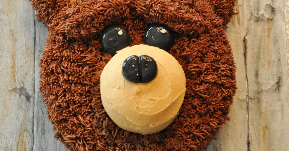 A friend asked me to make a Bear Head smash cake for her 1 year old'...