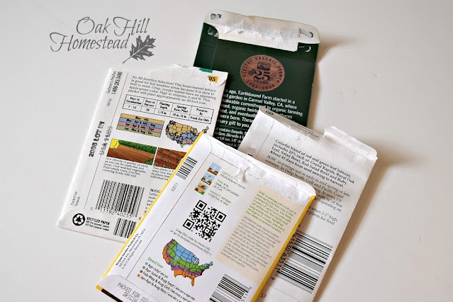 A variety of half-filled seed packets from last year, showing the planting information for each type of seed.