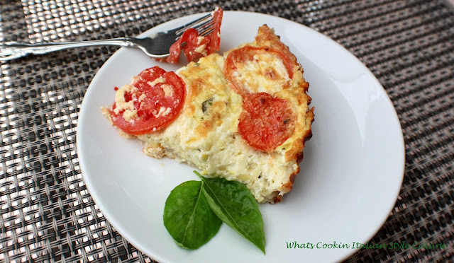 Zucchini Tomato Tart this is a pastry crust tart like quiche filled and baked with mozzarella cheese, zucchini shredded and sliced tomatoes in a rich egg filling into the crust and baked