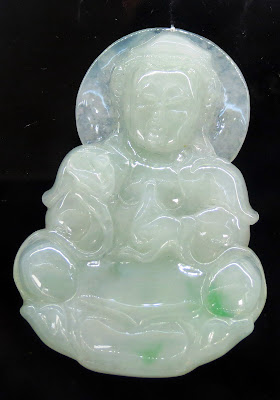 unique white jade pendant with a bit of green color unique white jade pendant with a bit of green color