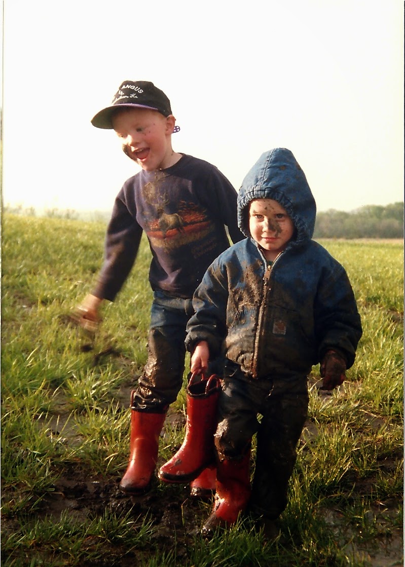 Kids, Cows and Grass: April showers bring May flowers...and muddy boys!