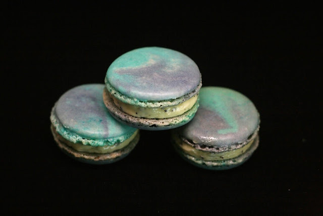 cosmic macarons on a black background