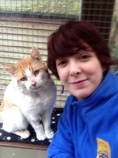 Another start for Edmund FIV cat Edmund with his fosterer Emma