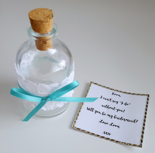 Looking for a cute way to ask your friends to be your bridesmaids?  Use this cute and easy message in a bottle idea for your bridesmaid proposal - click to find out more!