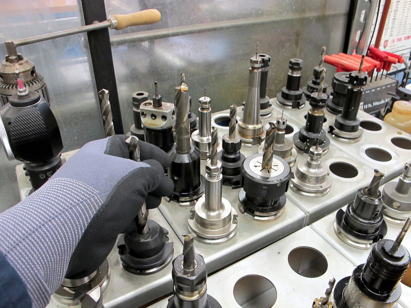 "Nothing Too Strong Ever Broke" Gloves in the machine shop