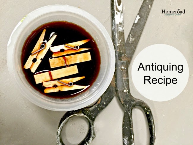 Scissors and clothespins in antiquing solution
