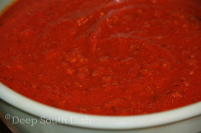 A homemade spaghetti meat sauce made with fresh tomatoes and ground beef.