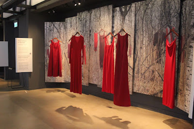 Missing and Murdered Women installation with hanging red dresses.
