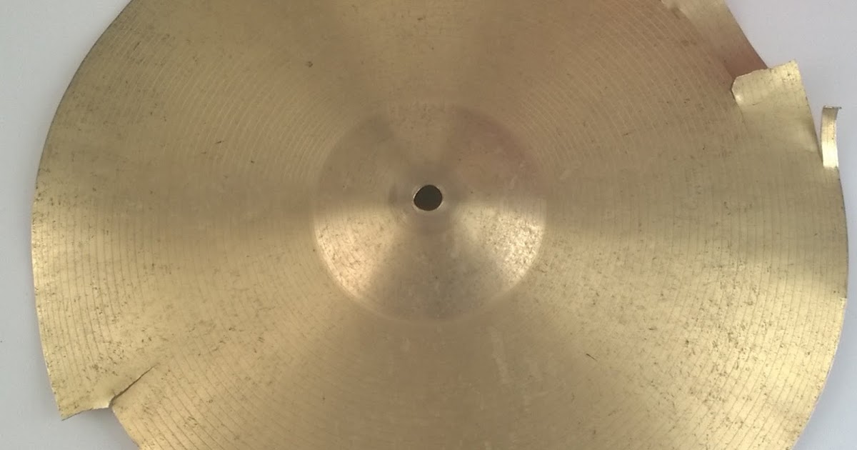 English Drummer Trimming a broken cymbal