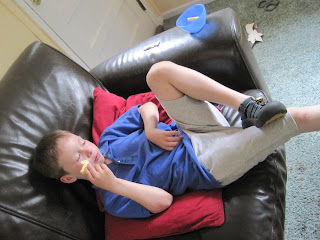 Boy eating sliced apple