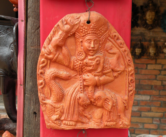 Decorative clay panel depicting a scene from Hindu mythology 