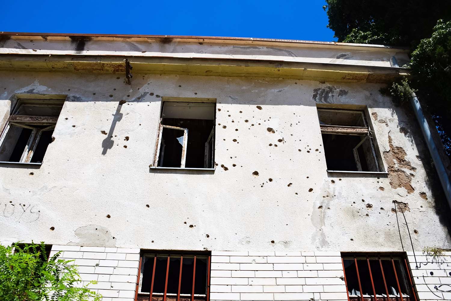 bullet holes in buildings around mostar