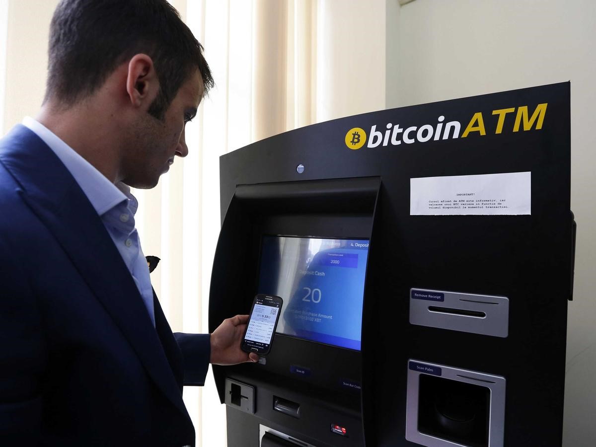 expedia prende bitcoin