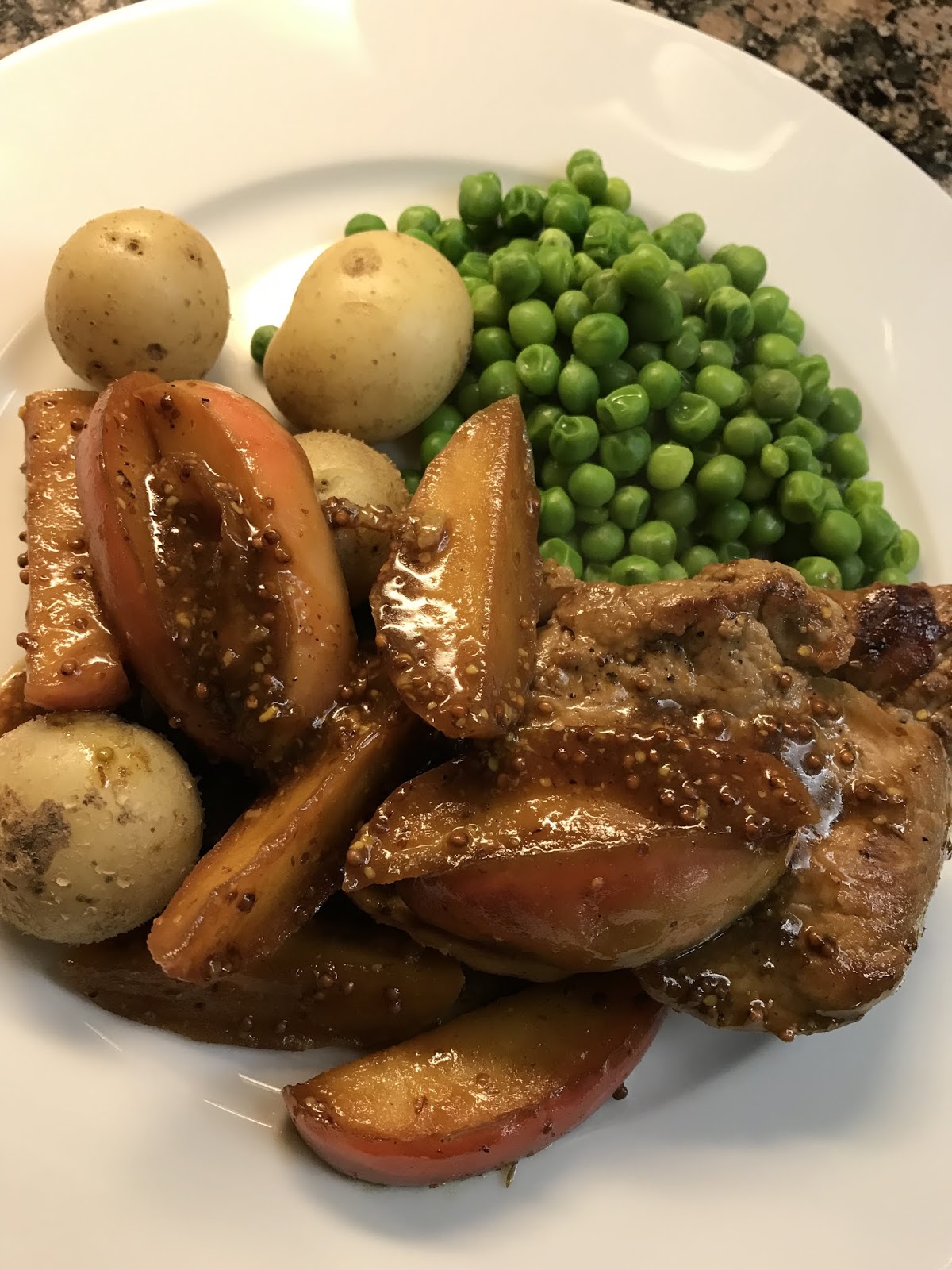 Sticky maple pork with apples