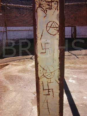 Boggo Road exercise yard Political symbols of white frustration, Boggo Road Gaol yards. (BRGHS)
