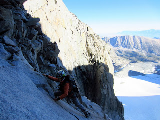 Scrambling up the 3rd/4th class rock in the gully leading to the U-Notch.