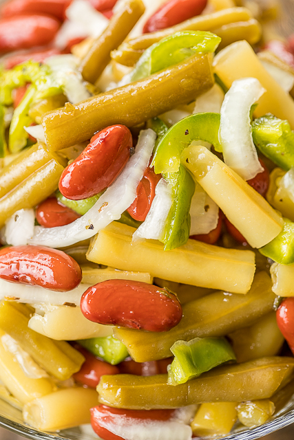 Three Bean Salad - so quick and delicious!! Green Beans, Yellow Wax Beans, Kidney Beans, Vidalia Onion, Green Bell Pepper tossed in sugar, cider vinegar, oil, salt and pepper. Make in advance in refrigerate until ready to serve. Great for potlucks and cookouts! #salad #sidedish #beans #nobake Three Bean Salad - so quick and delicious!! Green Beans, Yellow Wax Beans, Kidney Beans, Vidalia Onion, Green Bell Pepper tossed in sugar, cider vinegar, oil, salt and pepper. Make in advance in refrigerate until ready to serve. Great for potlucks and cookouts! #salad #sidedish #beans #nobake