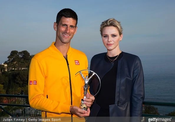Laureus World Sportsman of the Year 2015 winner and Tennis player Novak Djokovic of Serbia receives his award from Princess Charlene of Monaco at the Monte-Carlo Sporting Club 