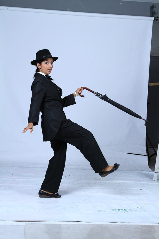 Meera Jasmine latest Photoshoot as Charlie Chaplin for Anbulla Kamal movie sexy stills