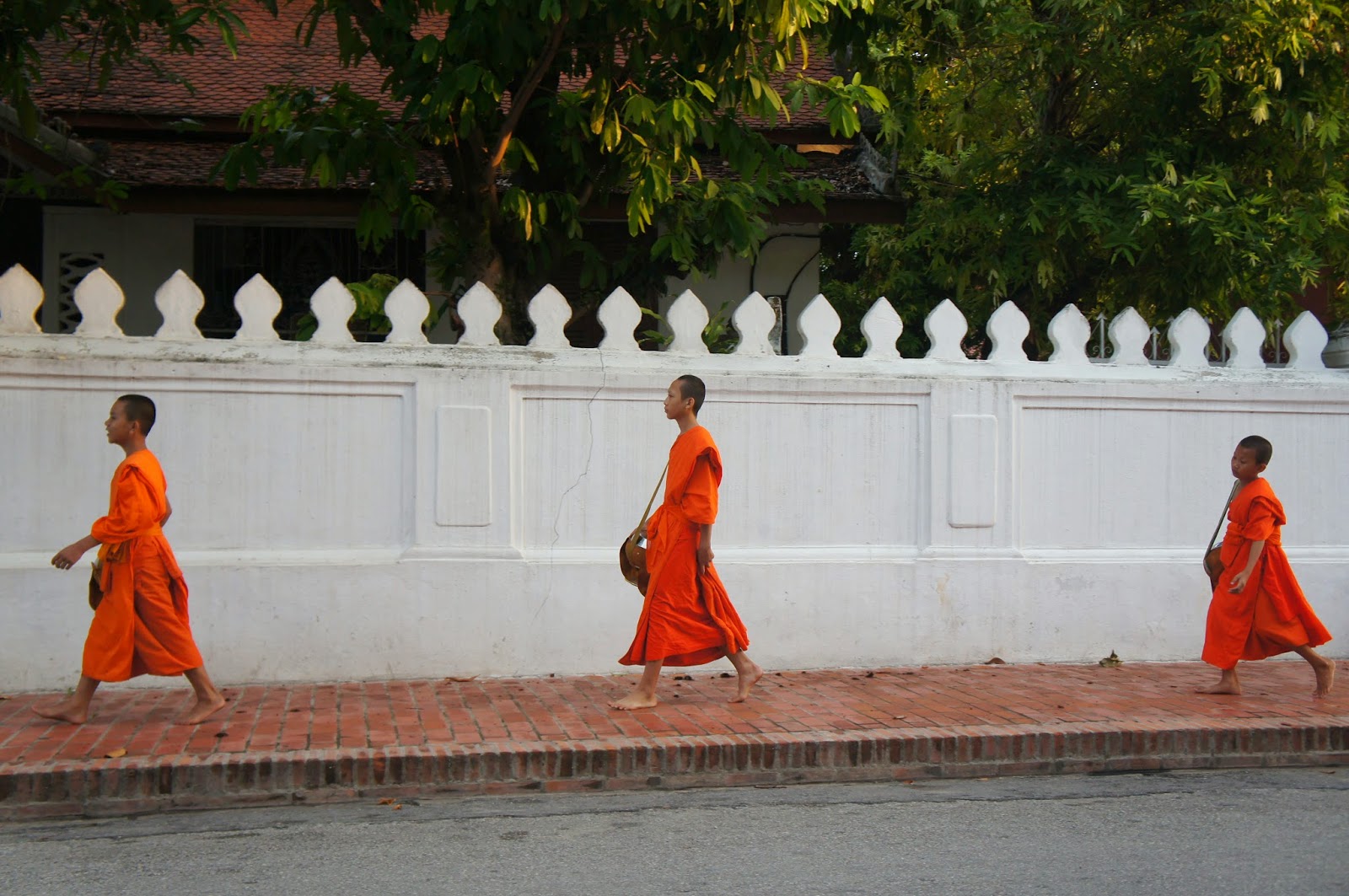 Luang Prabang - I noticed that the youngest monk usually walked at the end of their line