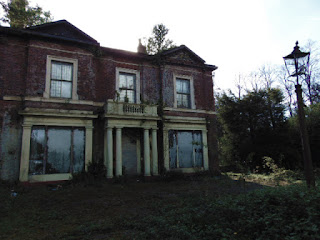 <img src="portico" alt=" https://derelictmanchester.blogspot.com/p/derelict-mansion-house-on-vine-st-and.html" />