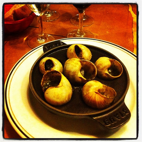 Behind the French Menu Escargots Snails. Snails on French Menus. How
