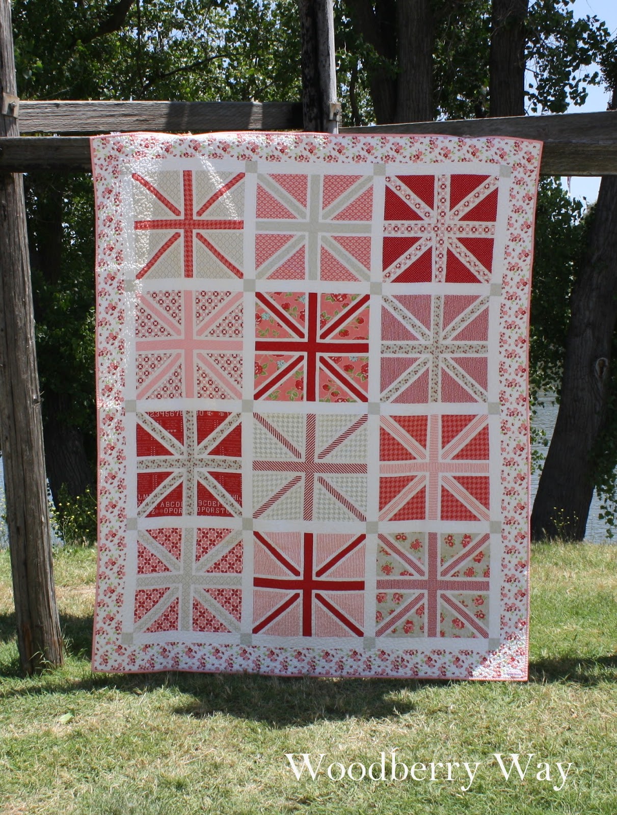 Woodberry Way Jumping Jacks Quilt in Red, Pink, and Grey