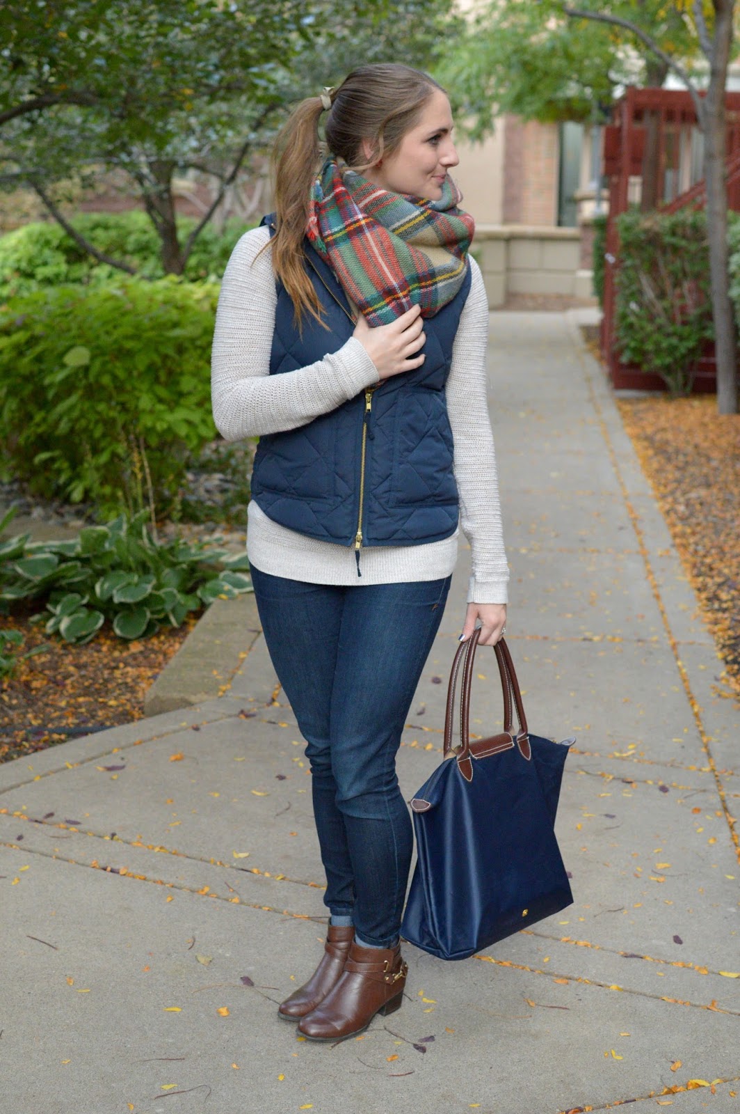 A Memory Of Us puffer vest with a blanket scarf A Kansas City