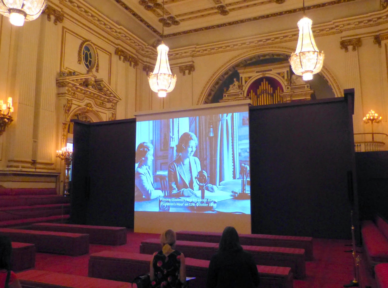 Footage about the Queen as a child being shown in The Ballroom