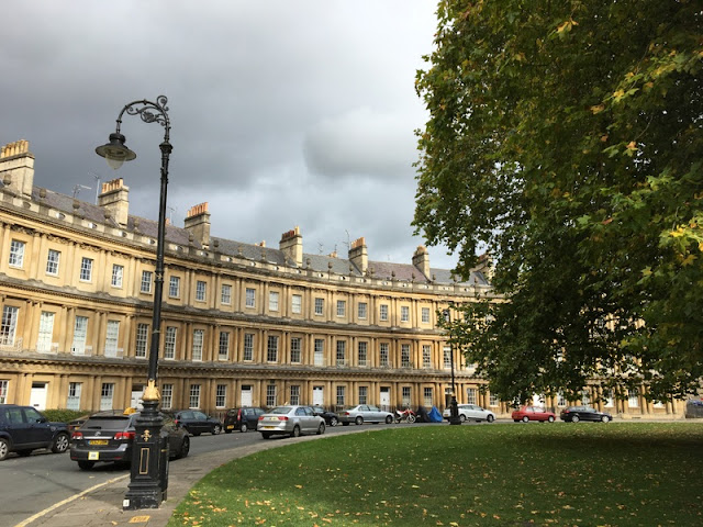Doings in Bath: The Circus, Iconic Georgian terraces built around a circular garden in Bath, England Georgian terraced houses built around a circular garden