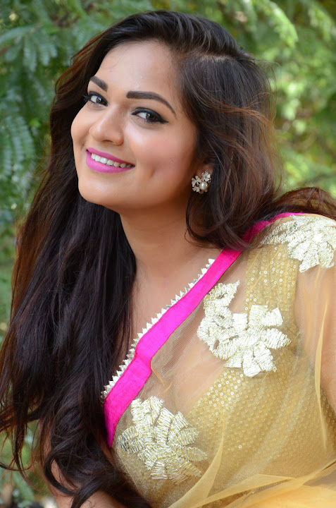 Ashwini Cleavage in Yellow Saree