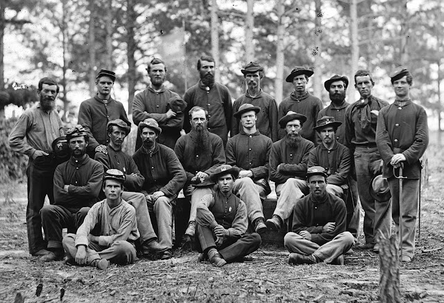A group men from Company B, U.S. Engineer Battalion, near Petersburg, Virginia in August of 1864.