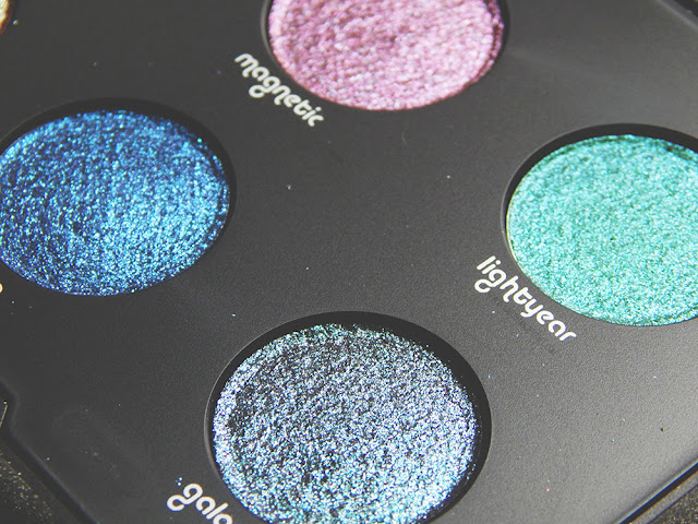 Urban Decay moondust Palette close up of Magnetic, Lightyear, Vega, and Galaxy.