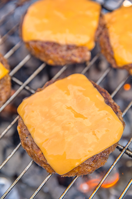 Cola Burgers - seriously delicious!! Ground beef, coke, French dressing, saltine crackers, and parmesan cheese. Top with your favorite cheese!! Can make patties ahead of time and freeze for later. Great for all your cookouts and tailgates! YUM! #burgers #grilling #tailgating #cookout Cola Burgers - seriously delicious!! Ground beef, coke, French dressing, saltine crackers, and parmesan cheese. Top with your favorite cheese!! Can make patties ahead of time and freeze for later. Great for all your cookouts and tailgates! YUM! #burgers #grilling #tailgating #cookout