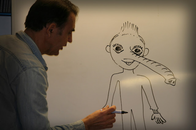 Svein Nyhus på Skjåk folkebibliotek. Foto Sigrun Eide Svein Nyhus på Skjåk folkebibliotek