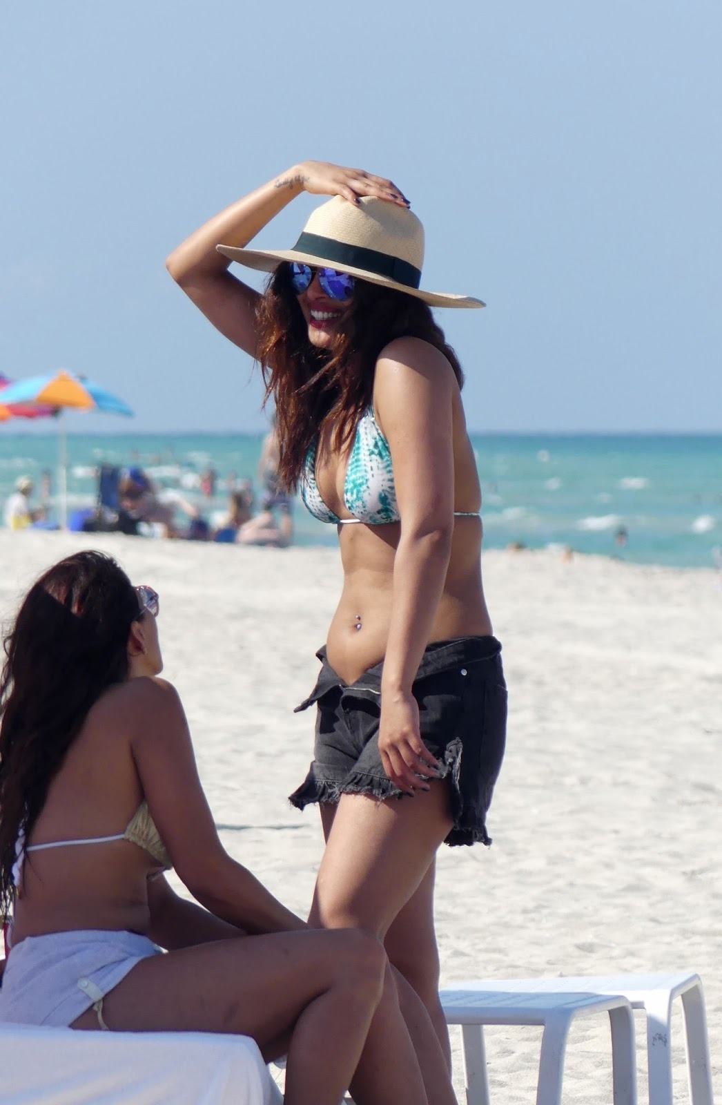 Priyanka Chopra Showcases Her Sexy Body in a Two Piece Bikini  As She Takes a Splash in Miami Beach