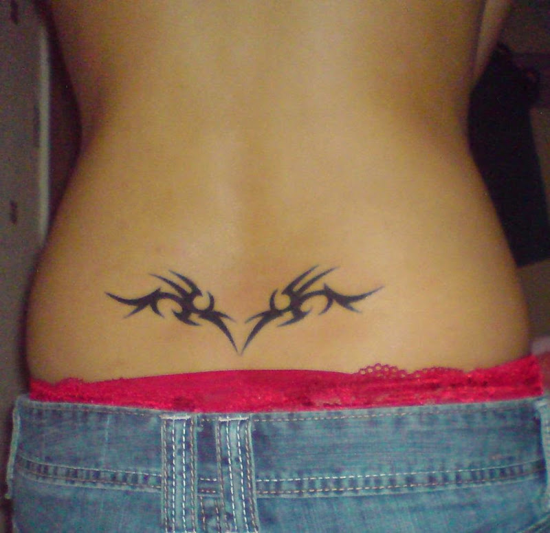simple lower back tattoos designs women lower back tattoos designs title=