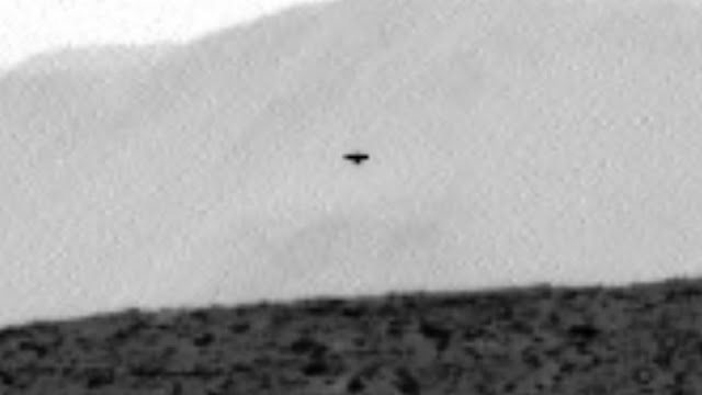 An even closer image showing the UFO and again it is in a different place on the red planet Mars. An-even-closer-image-showing-the-UFO-and-again-it-is-in-a-different-place-on-the-red-planet-Mars.