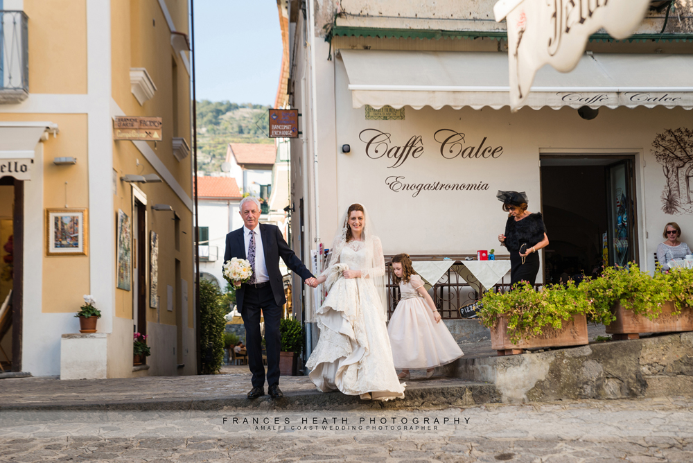 Bride walking with her father