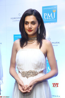 Tapsee Pannu looks Beautiful in White Sleeveless Gown Exclusive  Pics 07