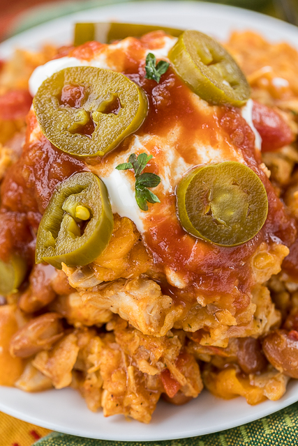 Mexican Chicken Casserole - seriously delicious! Everyone cleaned their plate - even our picky eaters!!! Chicken, tortilla chips, beans, diced tomatoes and green chiles, taco seasoning, cream of chicken soup and cheese. Can make ahead and freeze for later. We LOVE this easy casserole recipe! #casserole #chickencasserole #mexicancasserole #easydinnerrecipe Mexican Chicken Casserole - seriously delicious! Everyone cleaned their plate - even our picky eaters!!! Chicken, tortilla chips, beans, diced tomatoes and green chiles, taco seasoning, cream of chicken soup and cheese. Can make ahead and freeze for later. We LOVE this easy casserole recipe! #casserole #chickencasserole #mexicancasserole #easydinnerrecipe