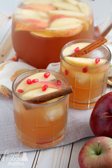 Warm spices, sweet pomegranate, and crisp apples come together perfectly in this Spiced Pomegranate Apple Cider Sangria. It will become your go-to cocktail for holiday entertaining!