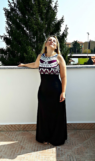 http://it.shein.com/Multicolor-Sleeveless-Geometric-Print-Dress-p-262801-cat-1727.html