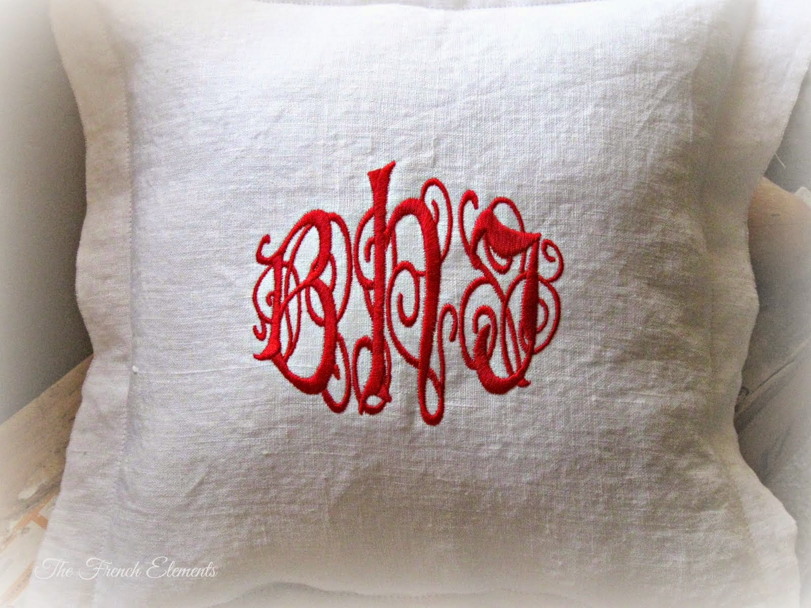 Embroidered monogram linen pillow