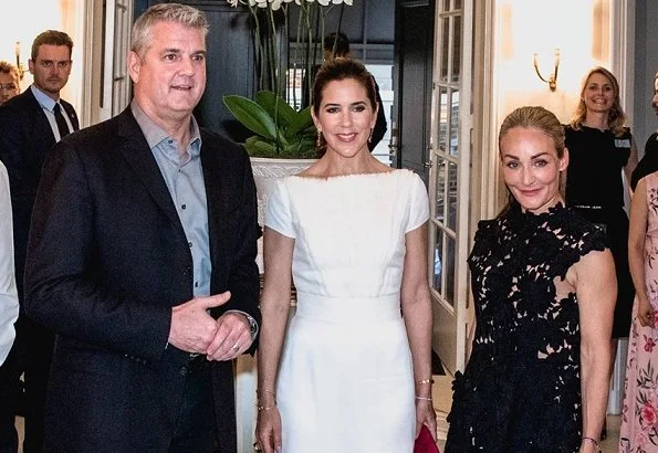 Crown princess Mary wore David Andersen dress and she wore Sergio Rossi Zani pumps and carried Carlend Copenhagen clutch at fashion dinner