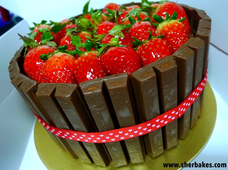 Chocolate Kit Kat Cake with a bed of Strawberries - Sherbakes