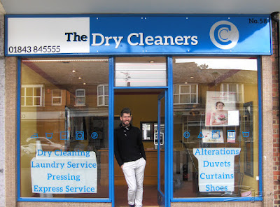 The Dry cleaners blue modern looking shop front. With phone number 01843 845555.Dry Cleaning, Laundry Servie, Pressing, Express Service, Alterations, Duvets, Curtains and shoes. Part of Clothes Care.