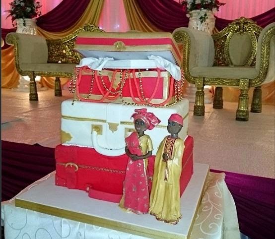 THE WEDDING CAKE Tobi,son of Pastor Ashimolowo holds traditional wedding