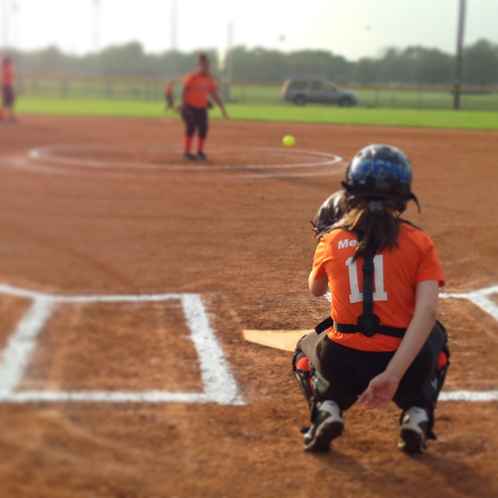 Photo by Shelly Kelly, 2014 Fastpitch softball, pitcher and catcher warming up
